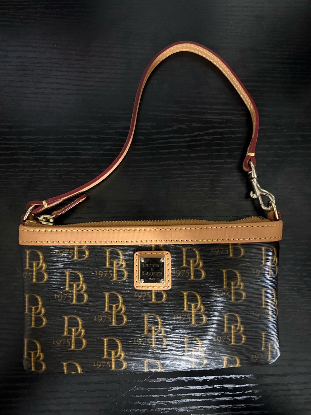 Dooney & Bourke Brown Logo Wristlet with Tan Trim and Red Accent Strap